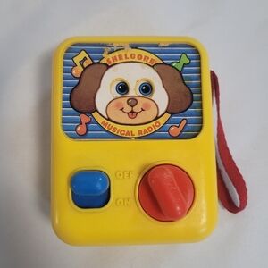 Vintage 1990 Shelvore Musical Wind Up Radio Lullaby Toy Puppy Yellow